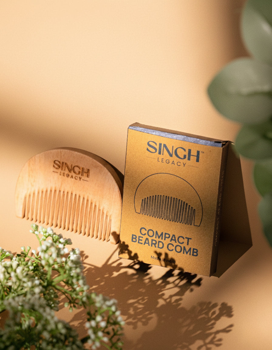 Singh Legacy Compact Beard Comb – lifestyle with gold box and flowers