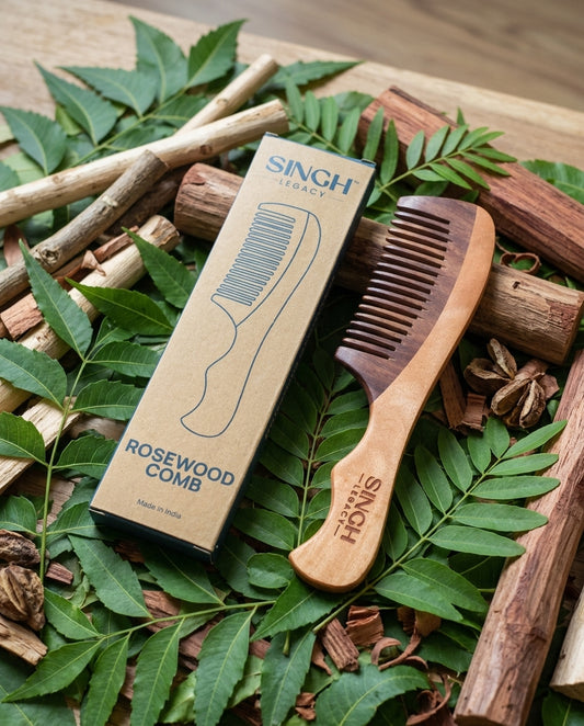 Singh Legacy Rosewood Comb – with branded kraft box on natural wood and leaves