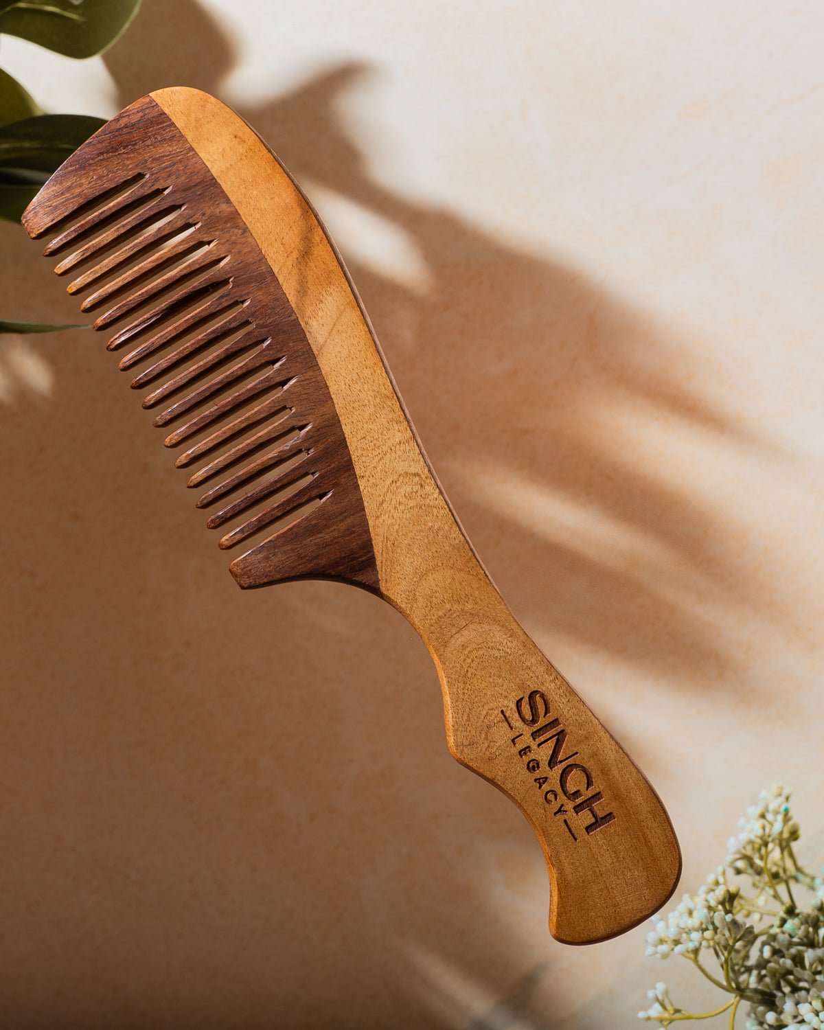 Singh Legacy Rosewood Comb – lifestyle shot with natural background